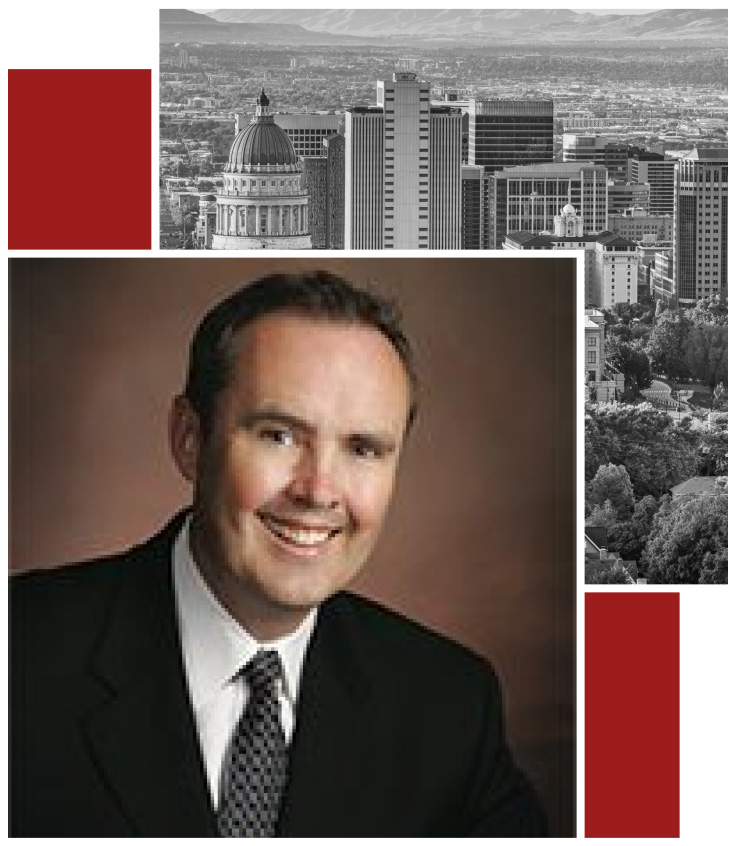 Collage featuring a black-and-white cityscape of Salt Lake City, Utah, above a professional portrait of a smiling Wayne Giles in a suit and tie, framed by red decorative blocks.